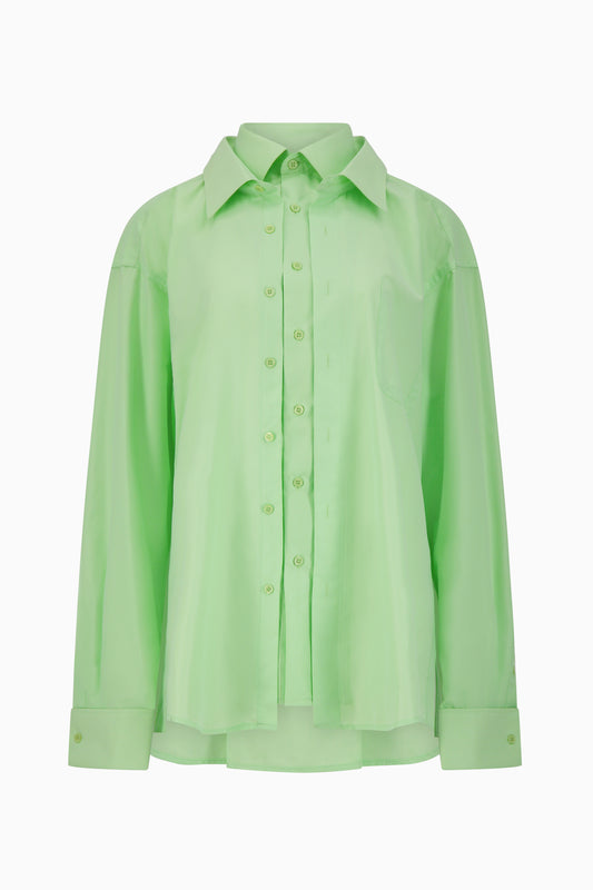 Front view of vibrant green double button up shirt.