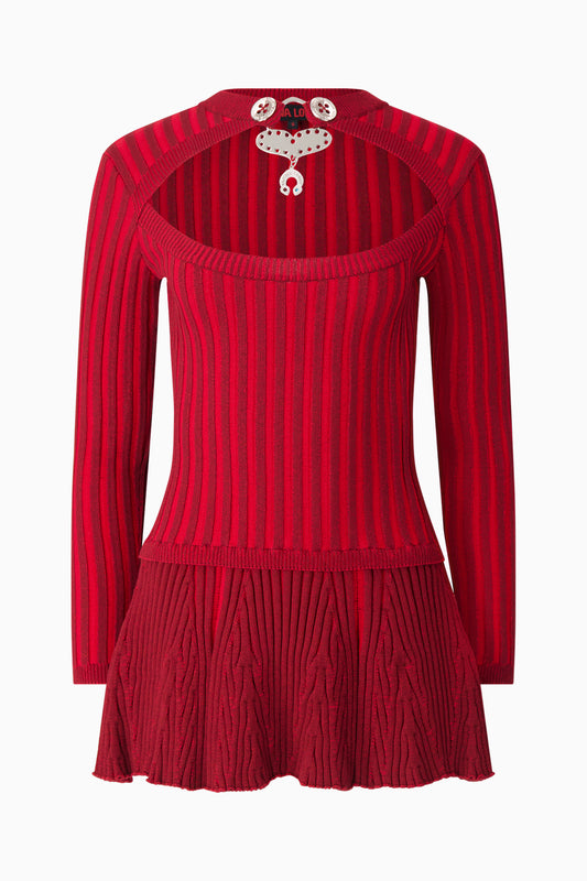 Red ribbed knit with open sweetheart neckline and mini skirt. 