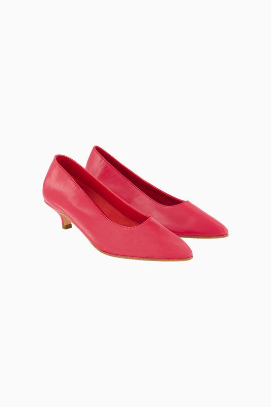 Martiniano red low heeled pointed toe pumps.