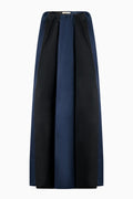 Navy blue pleated skirt on a white background