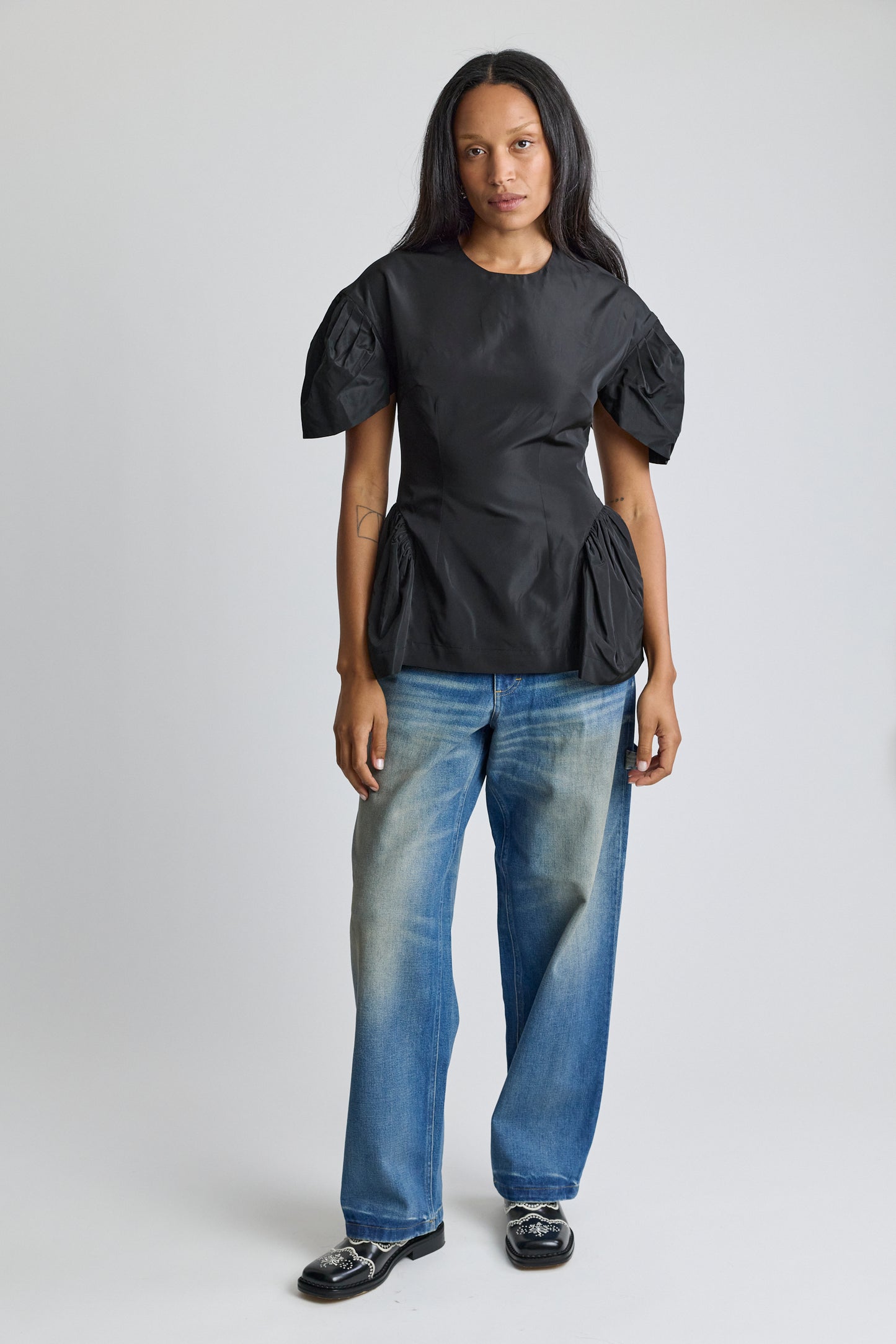 Sculpted Peplum Top