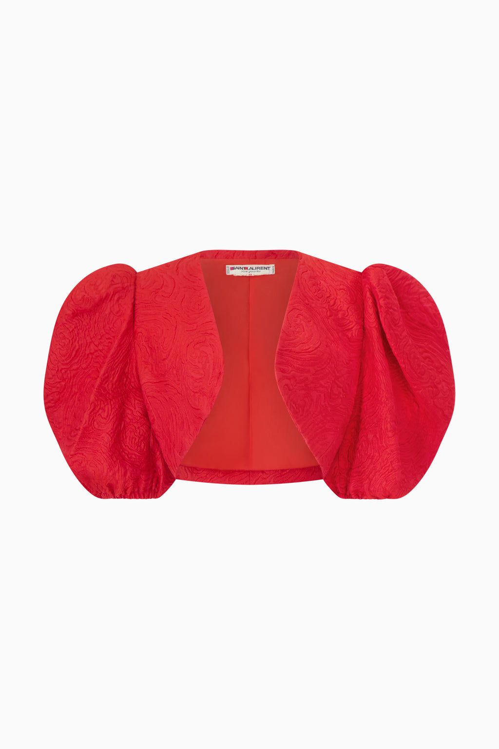 A red Saint Laurent bolero with puff sleeves and a square neckline.