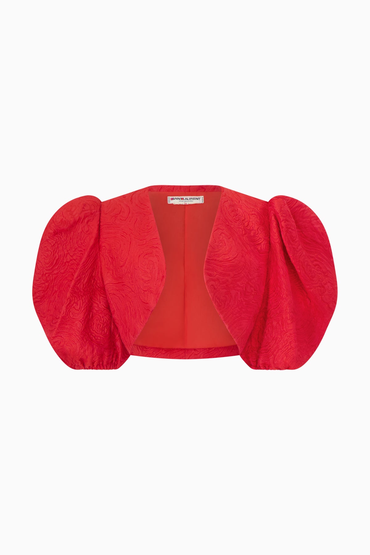 A red Saint Laurent bolero with puff sleeves and a square neckline.
