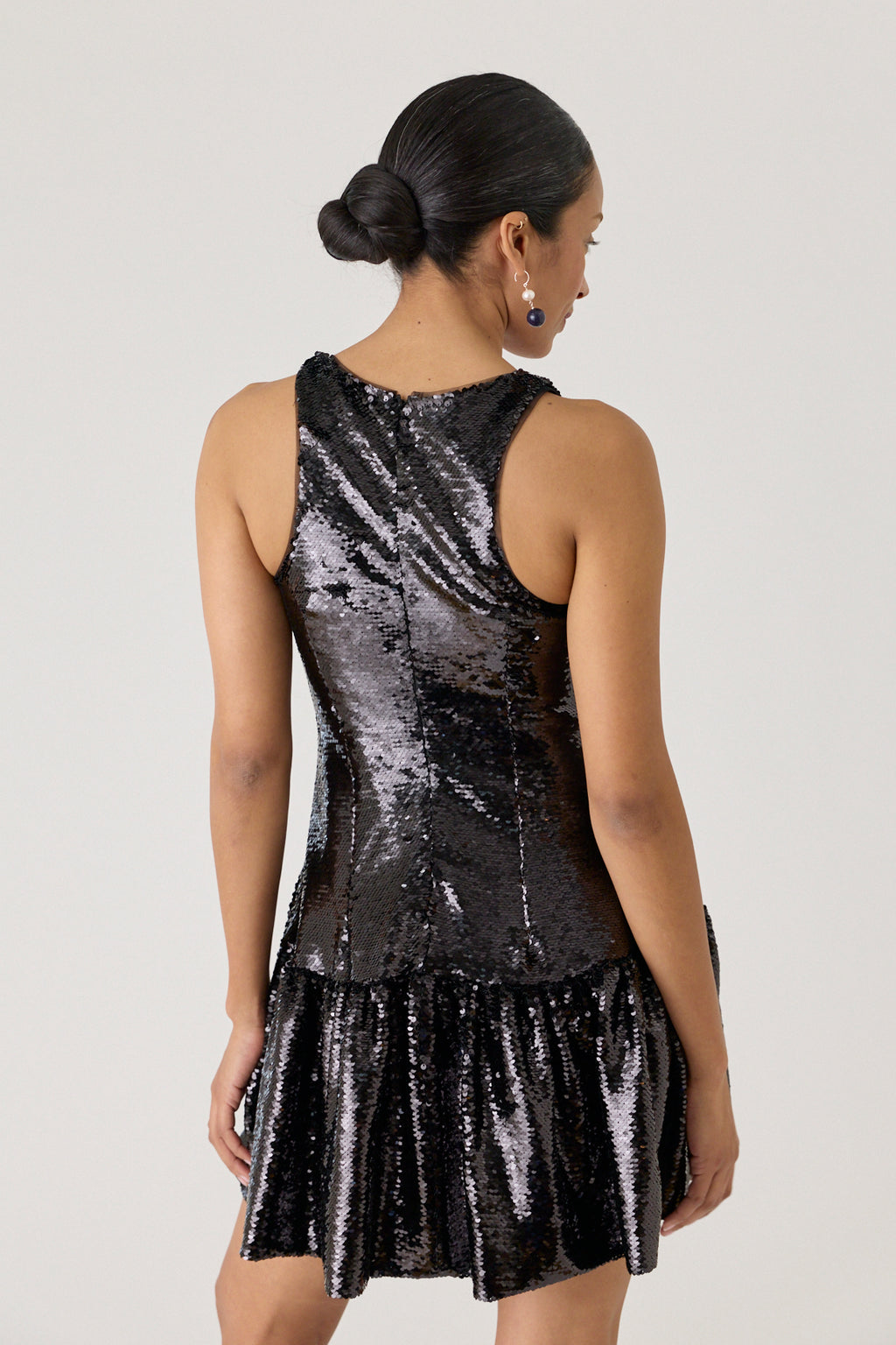 Tapered Back Peplum Mini Dress