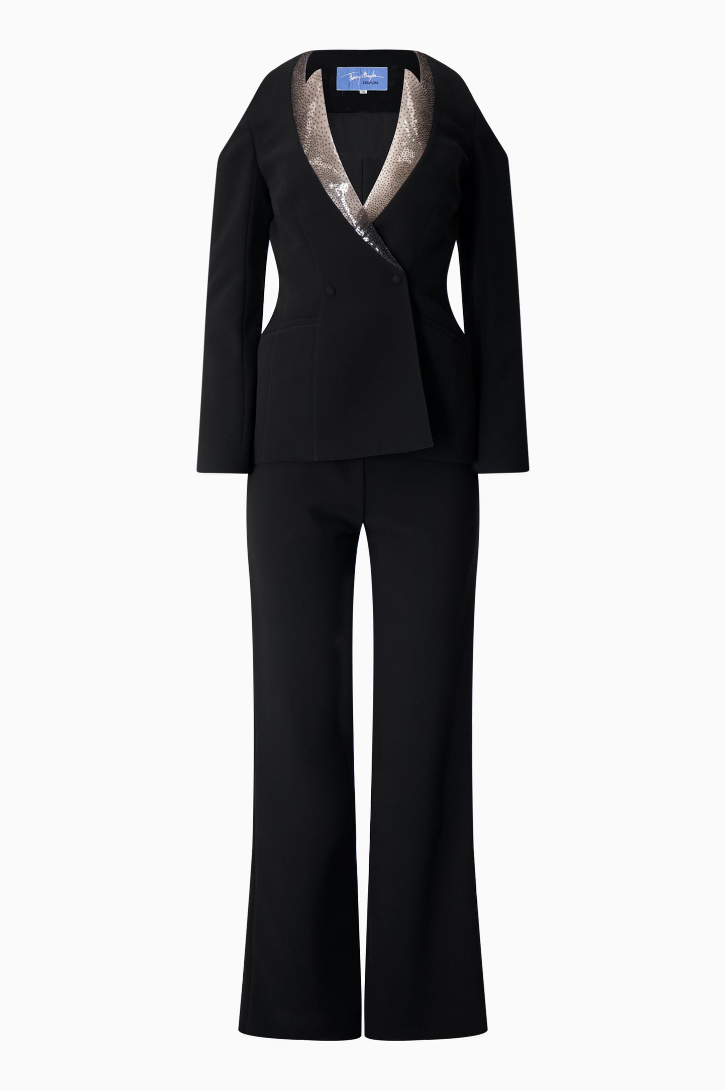 A Thierry Mugler black pantsuit with a sequinned collar.