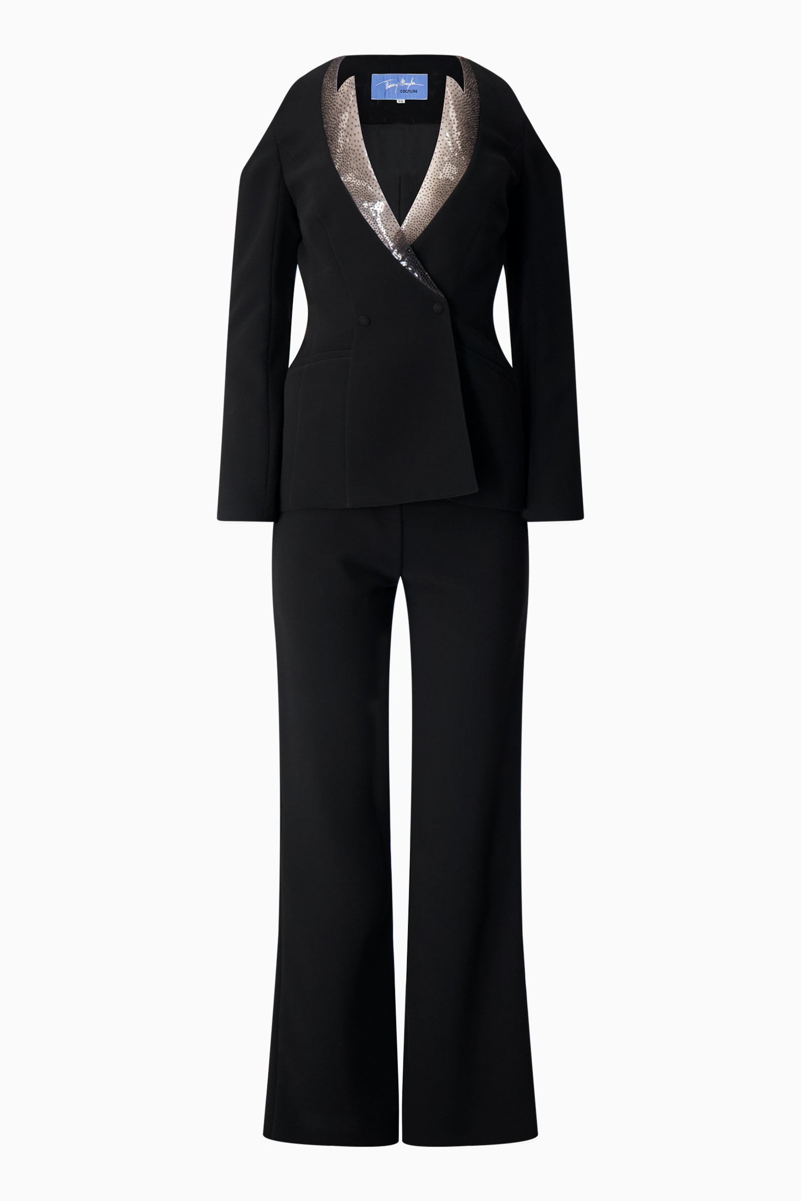 A Thierry Mugler black pantsuit with a sequinned collar.