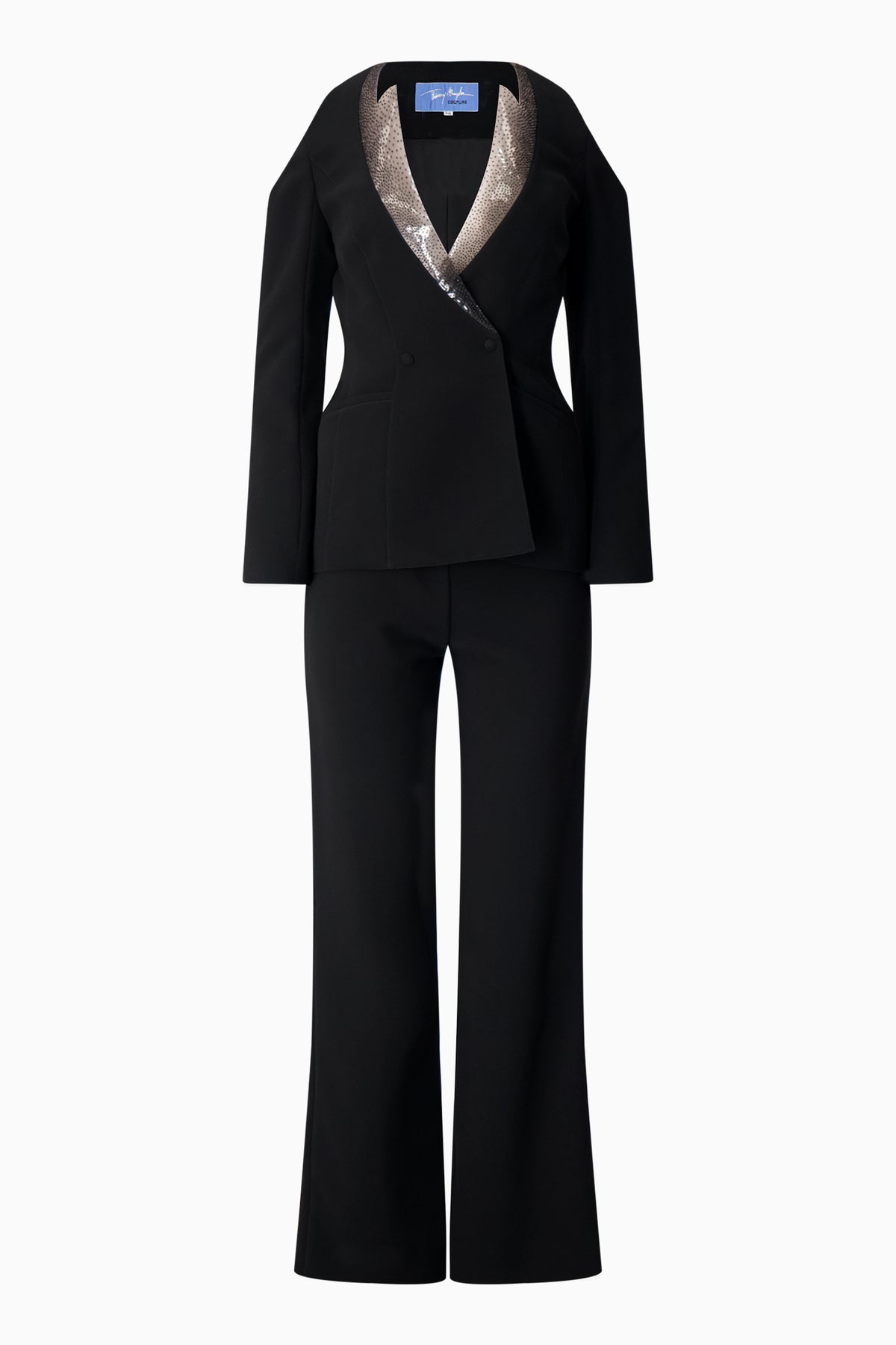 A Thierry Mugler black pantsuit with a sequinned collar.